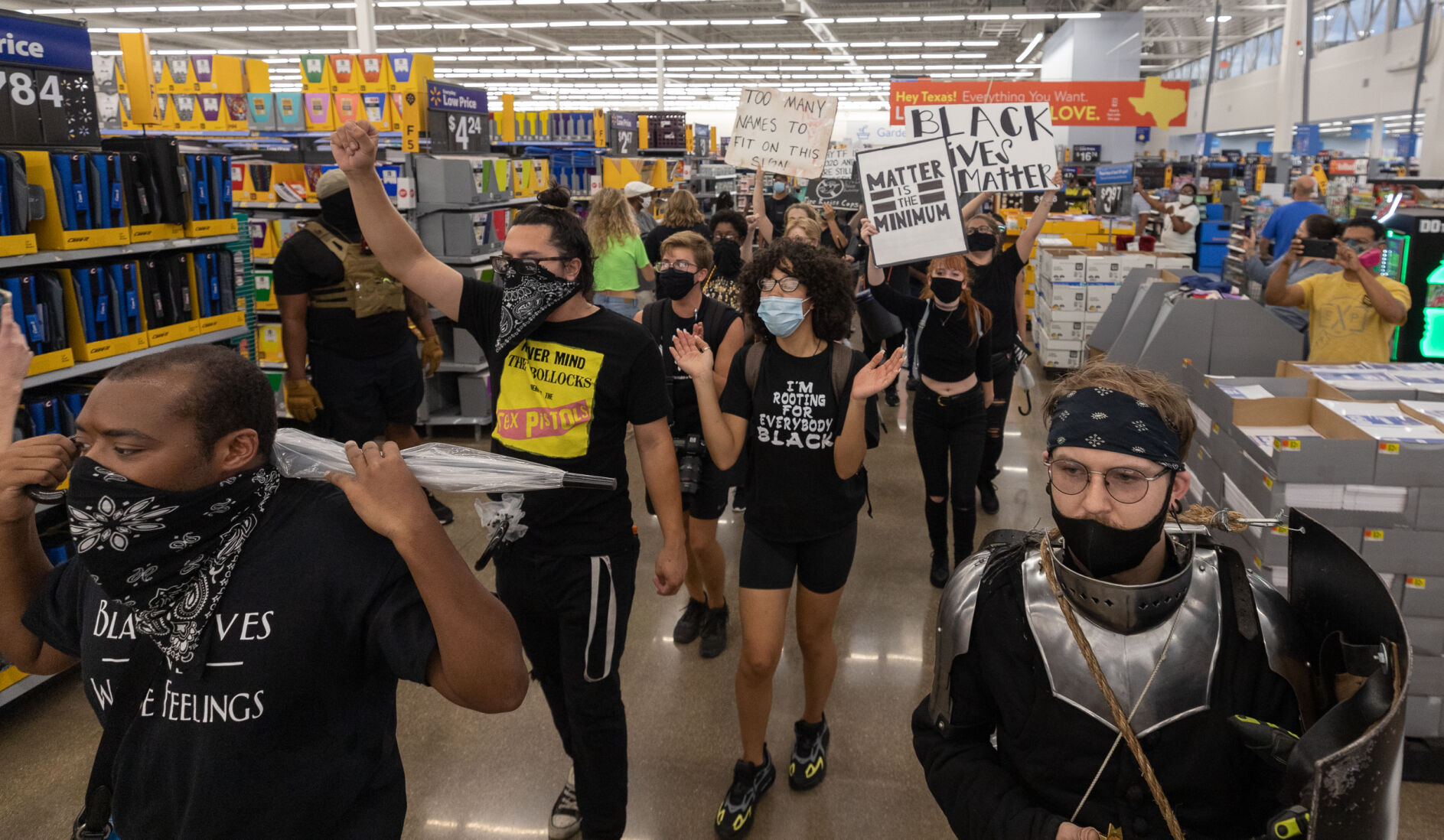 Photos: Activist group We Take The Streets holds march through Arlington in third month of protests